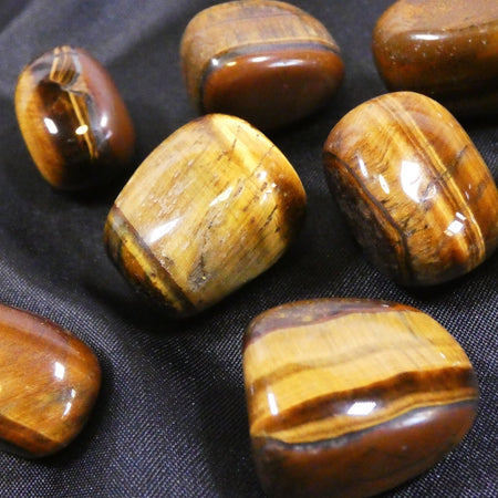 occhio di tigre burattato pietra protettiva sfumature dorate marroni