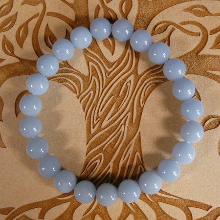 bracciale in Angelite con perle da 8 mm, ideale per calma interiore e connessione spirituale.