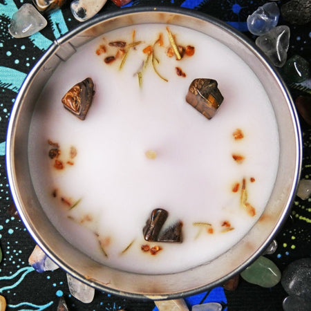 candela profumata energizzante con pietre e oli naturali