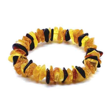 Bracciale per bambini in ambra russa naturale, con design barocco su comodo filo elastico.